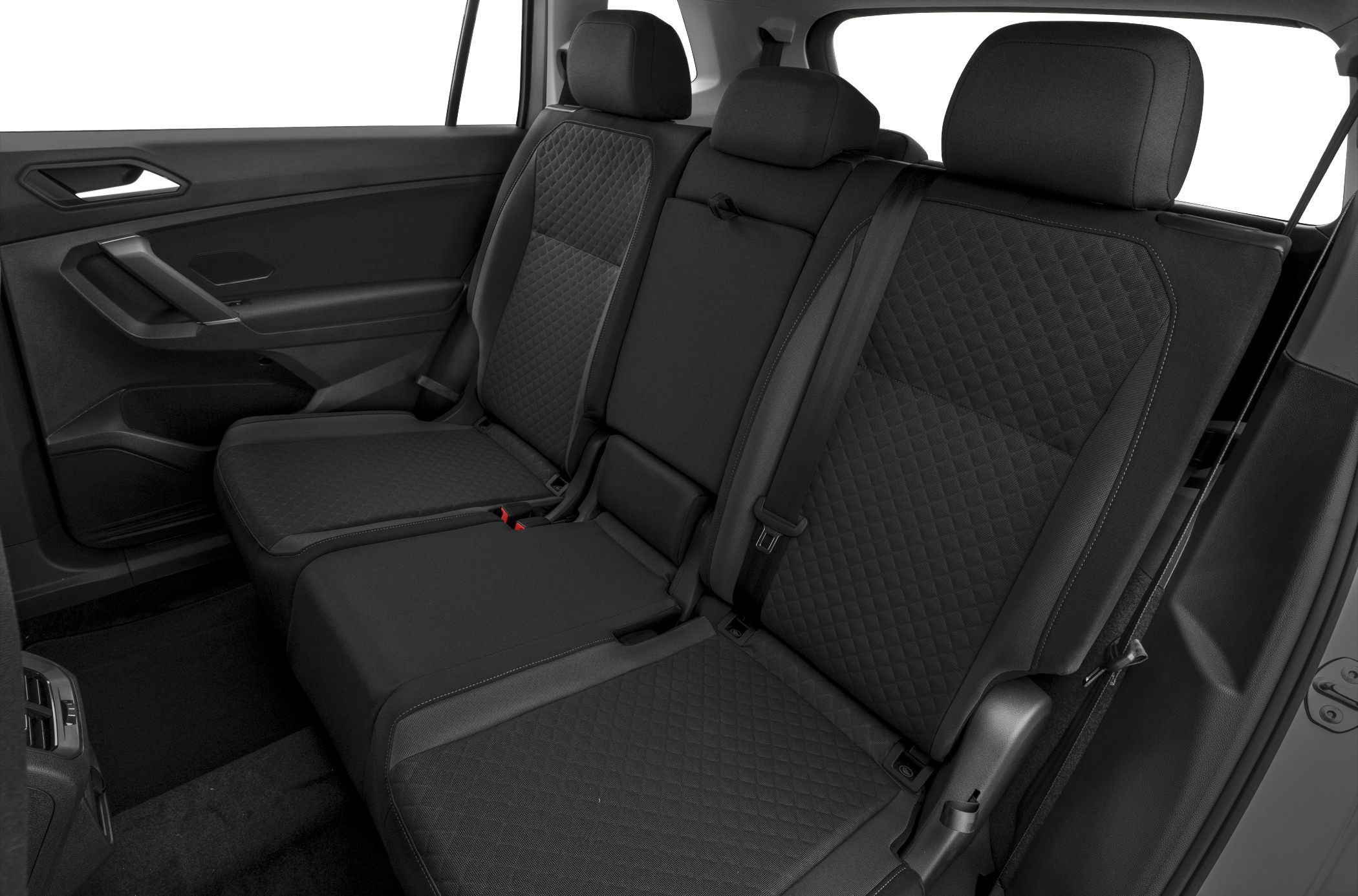 Rear seat interior with quilted upholstery and door panel