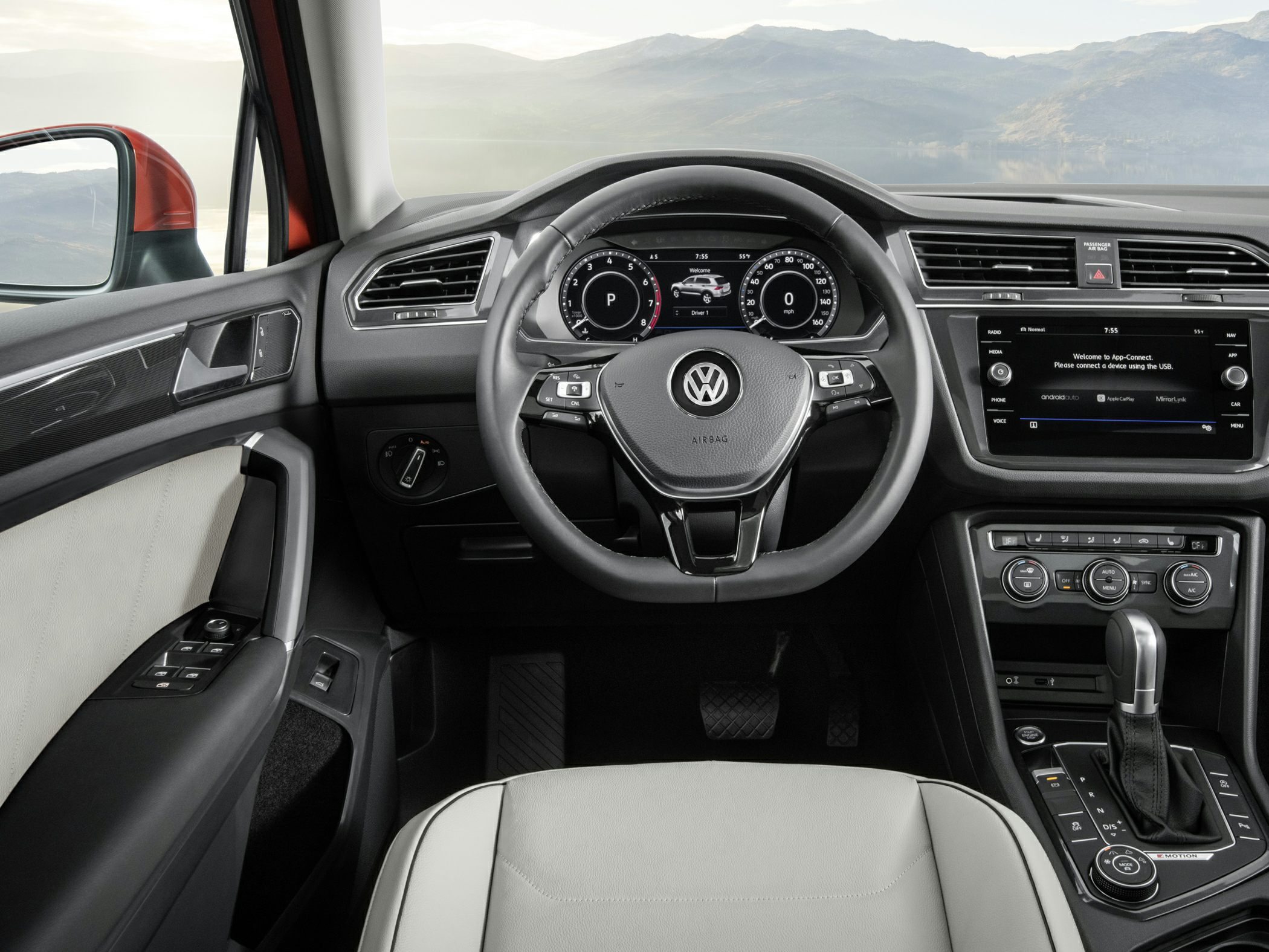 Dashboard and steering wheel with infotainment display and automatic gear shifter