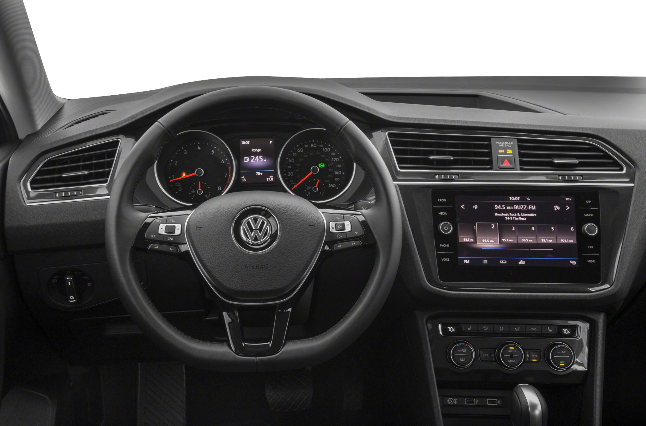 Steering wheel, dashboard, digital gauges, infotainment screen, climate controls