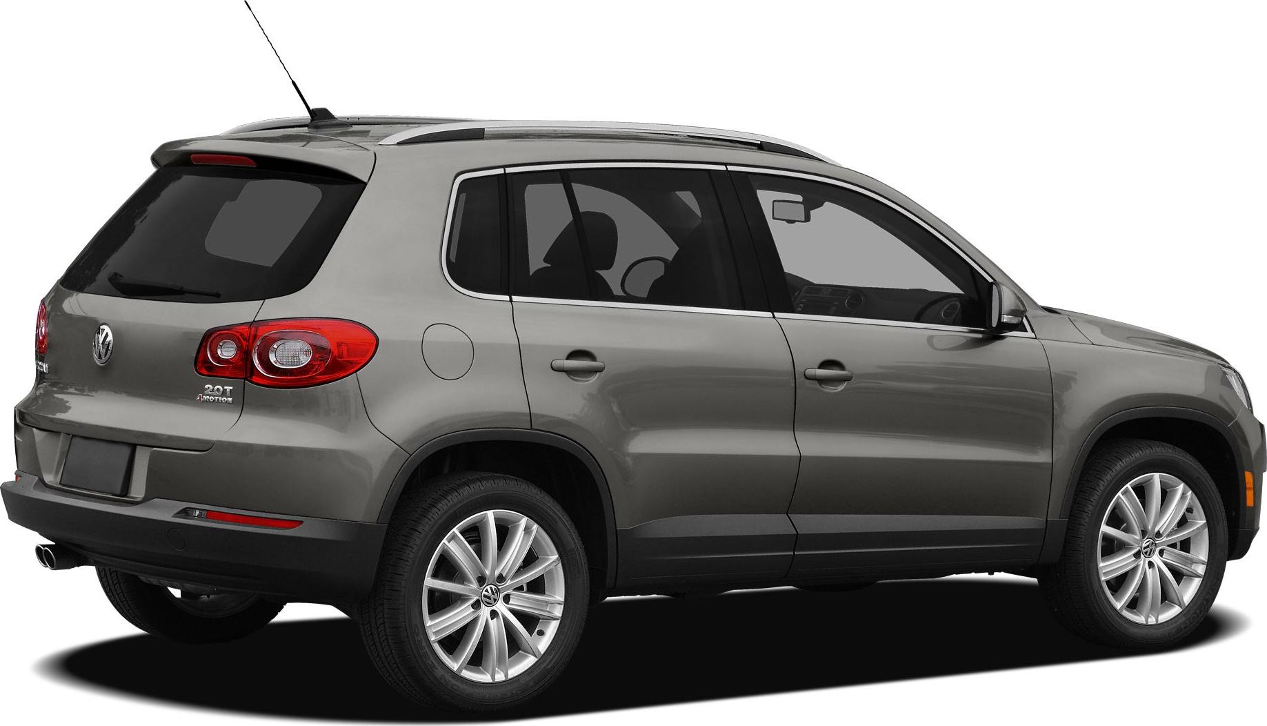 Rear side view of SUV with alloy wheels and roof rails
