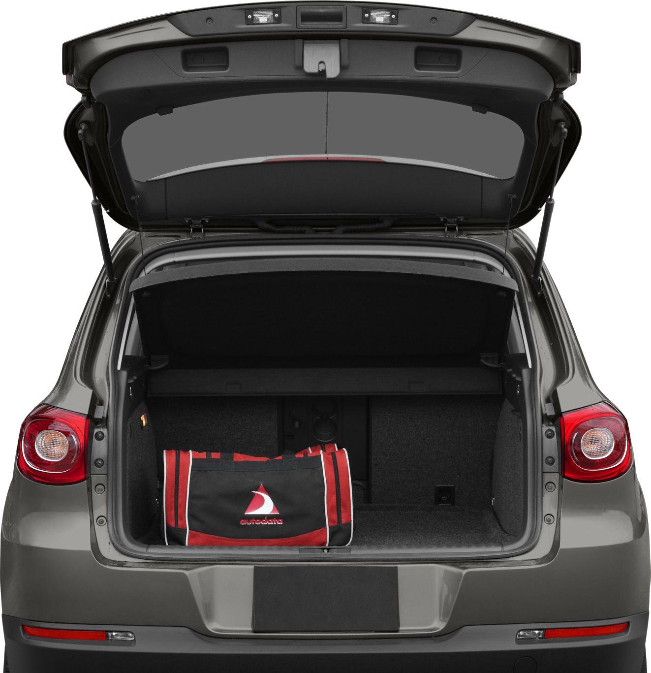 Open spacious trunk with interior cargo space and an item inside