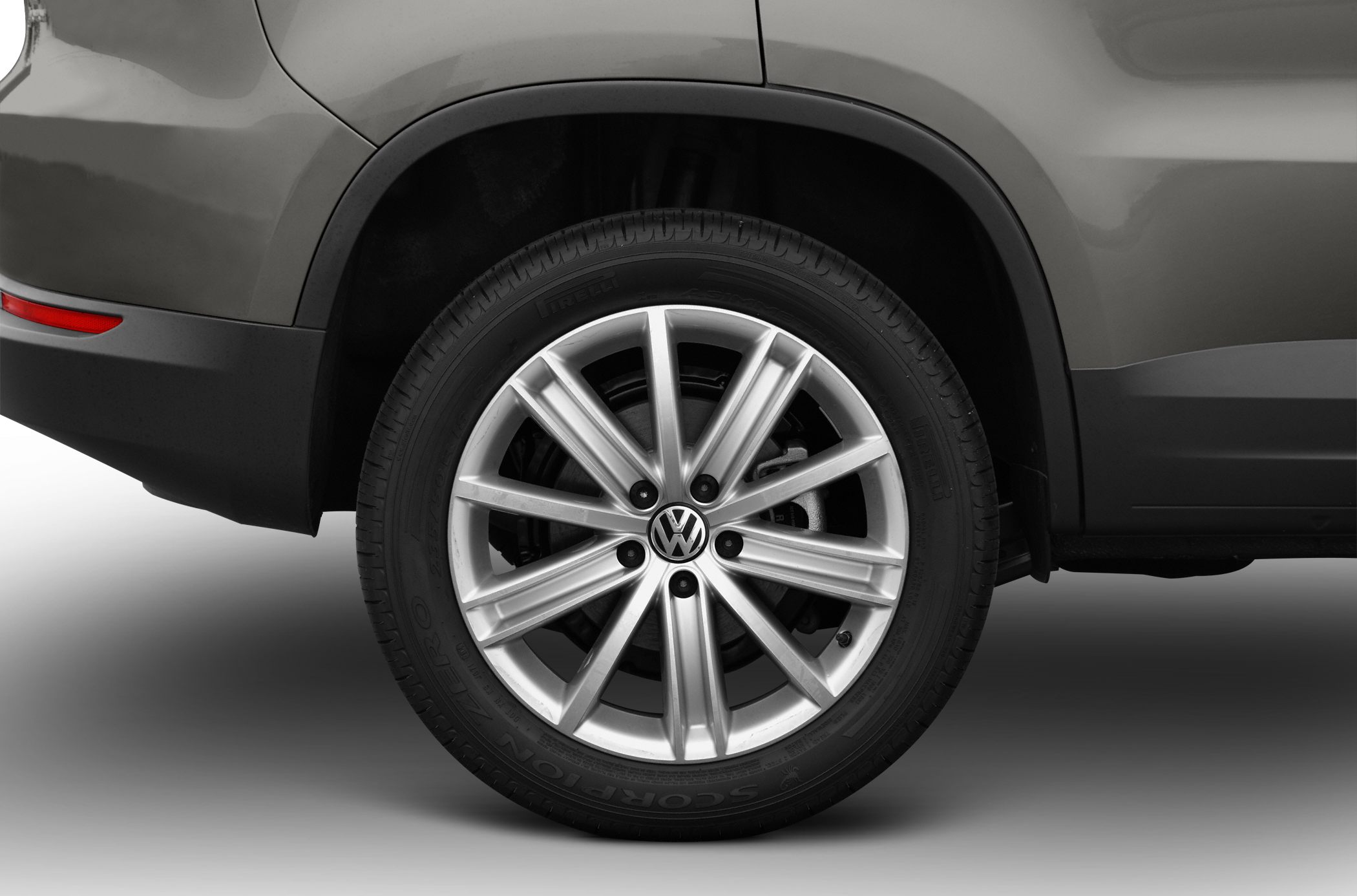 Close-up of alloy wheel and tire on vehicle rear side