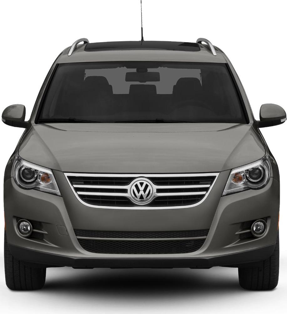 Front view with distinctive grille, headlights, and roof rails