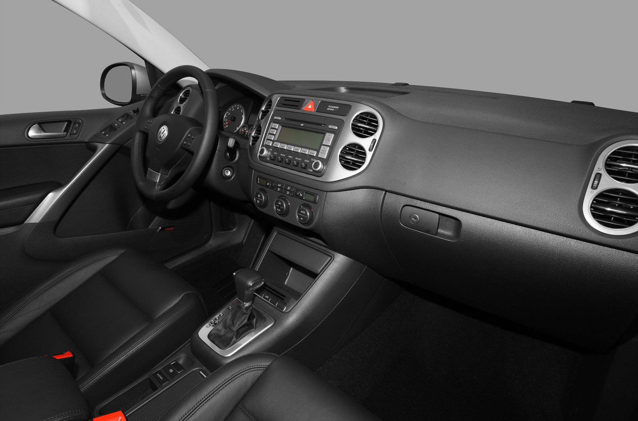 Car interior dashboard with steering wheel and center console