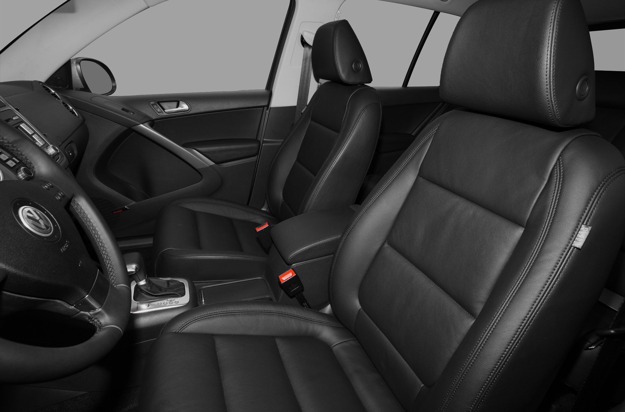 Leather seats and dashboard inside a modern SUV
