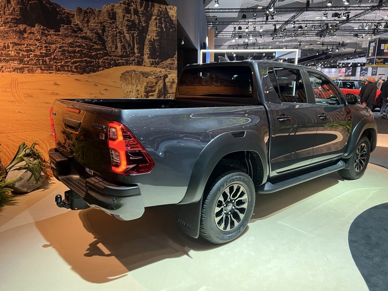 Rear and side exterior view with taillights and alloy wheels