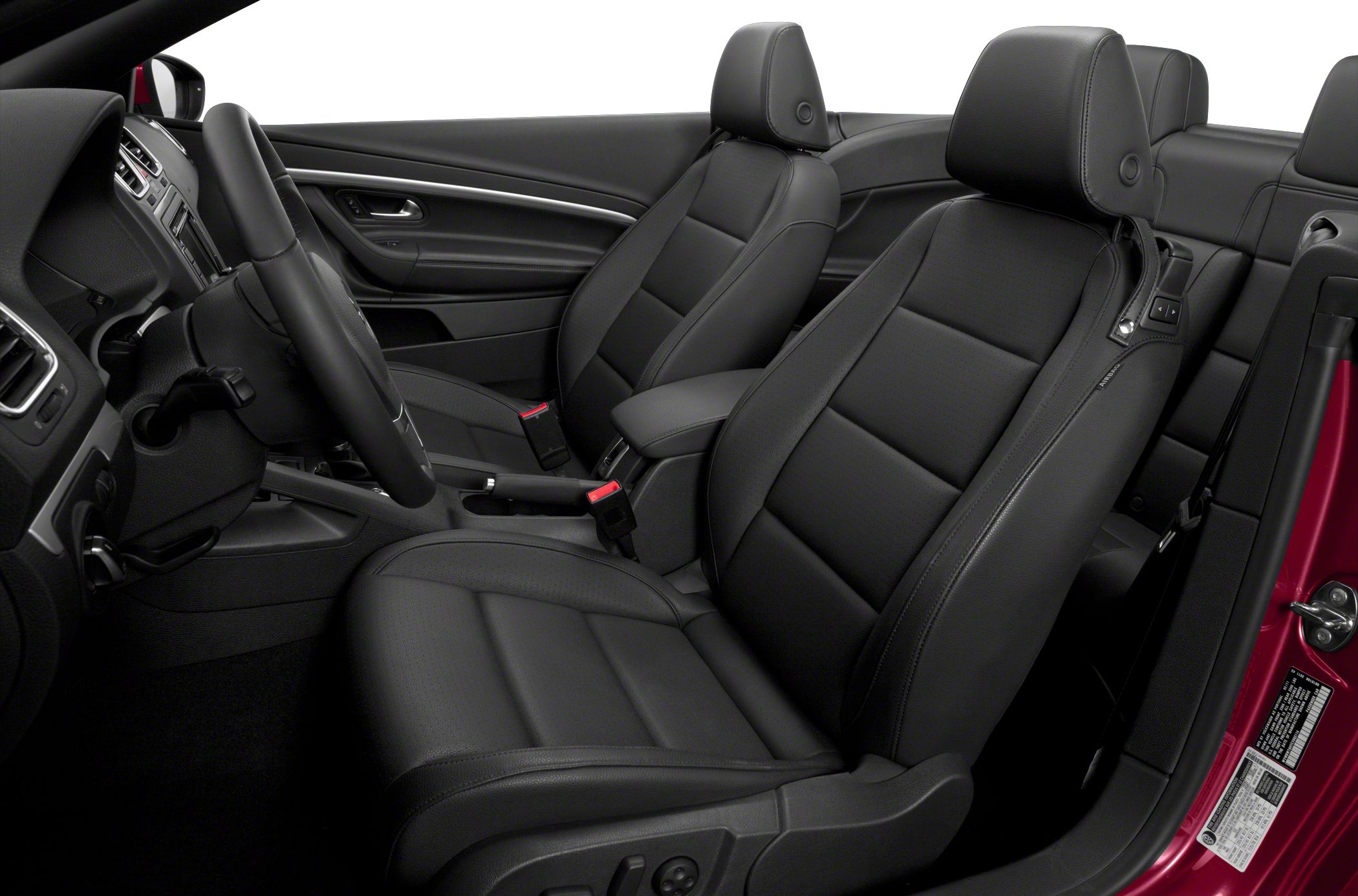 Black leather front seats and dashboard with steering wheel