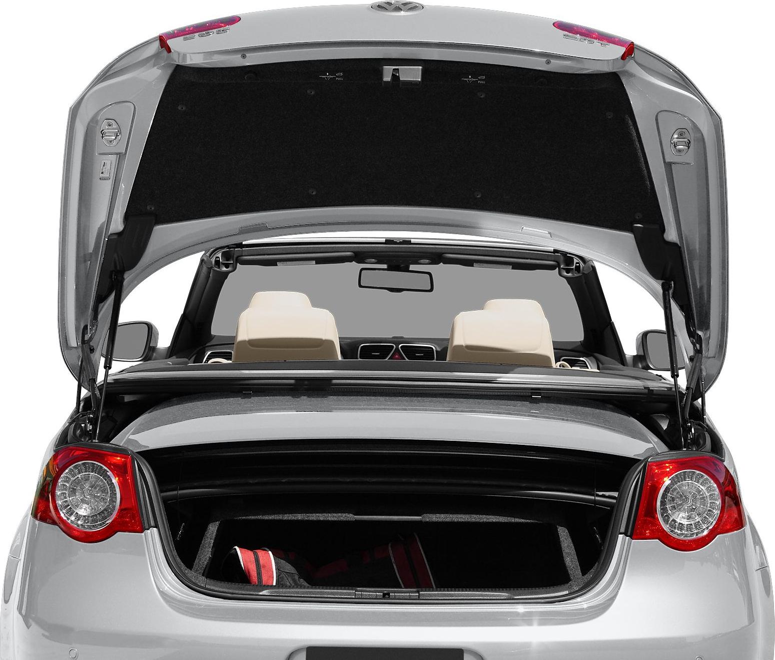 Rear view of convertible with trunk open and beige seats