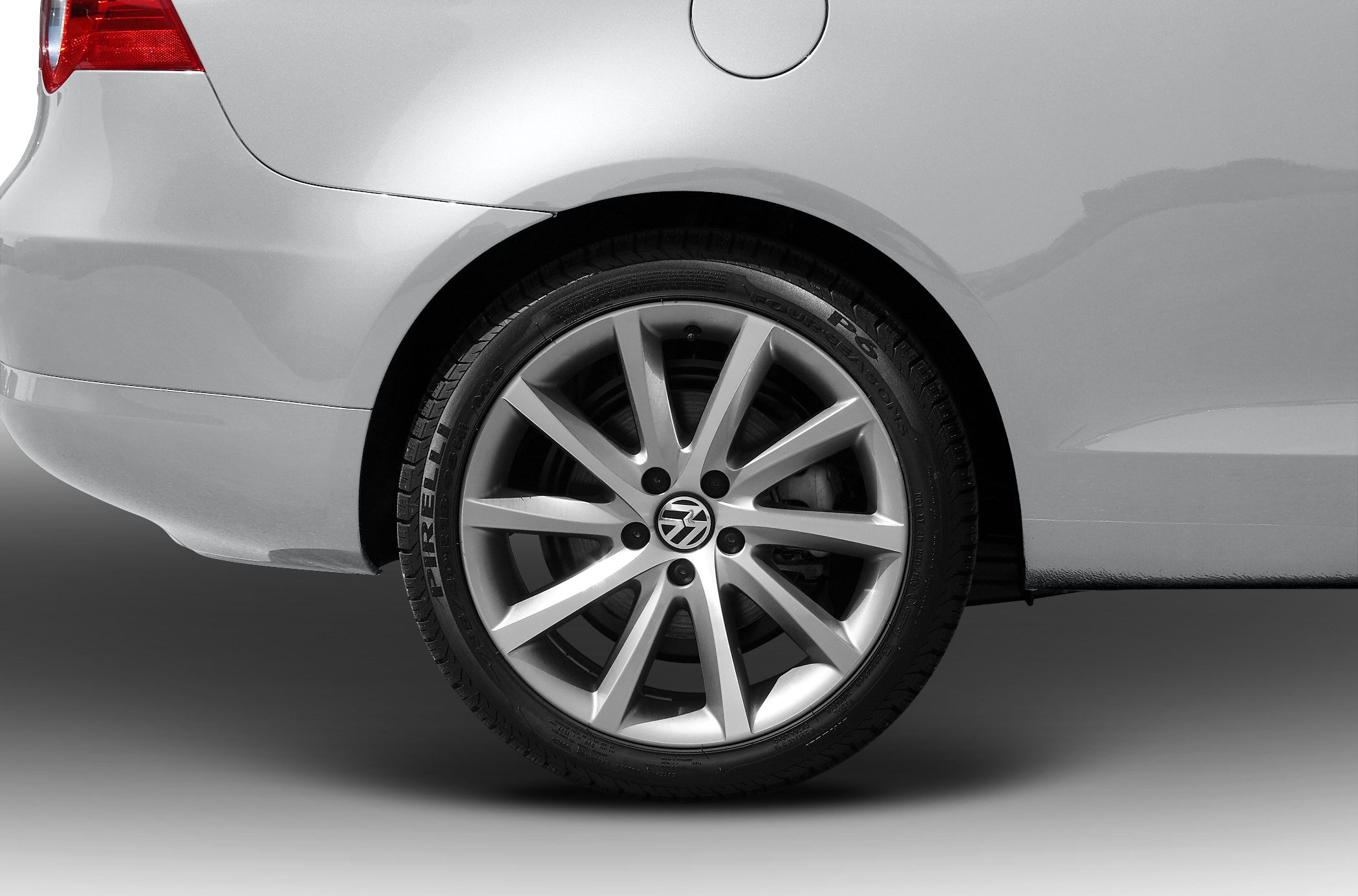 Rear alloy wheel with ten-spoke design and adjacent rear fender section