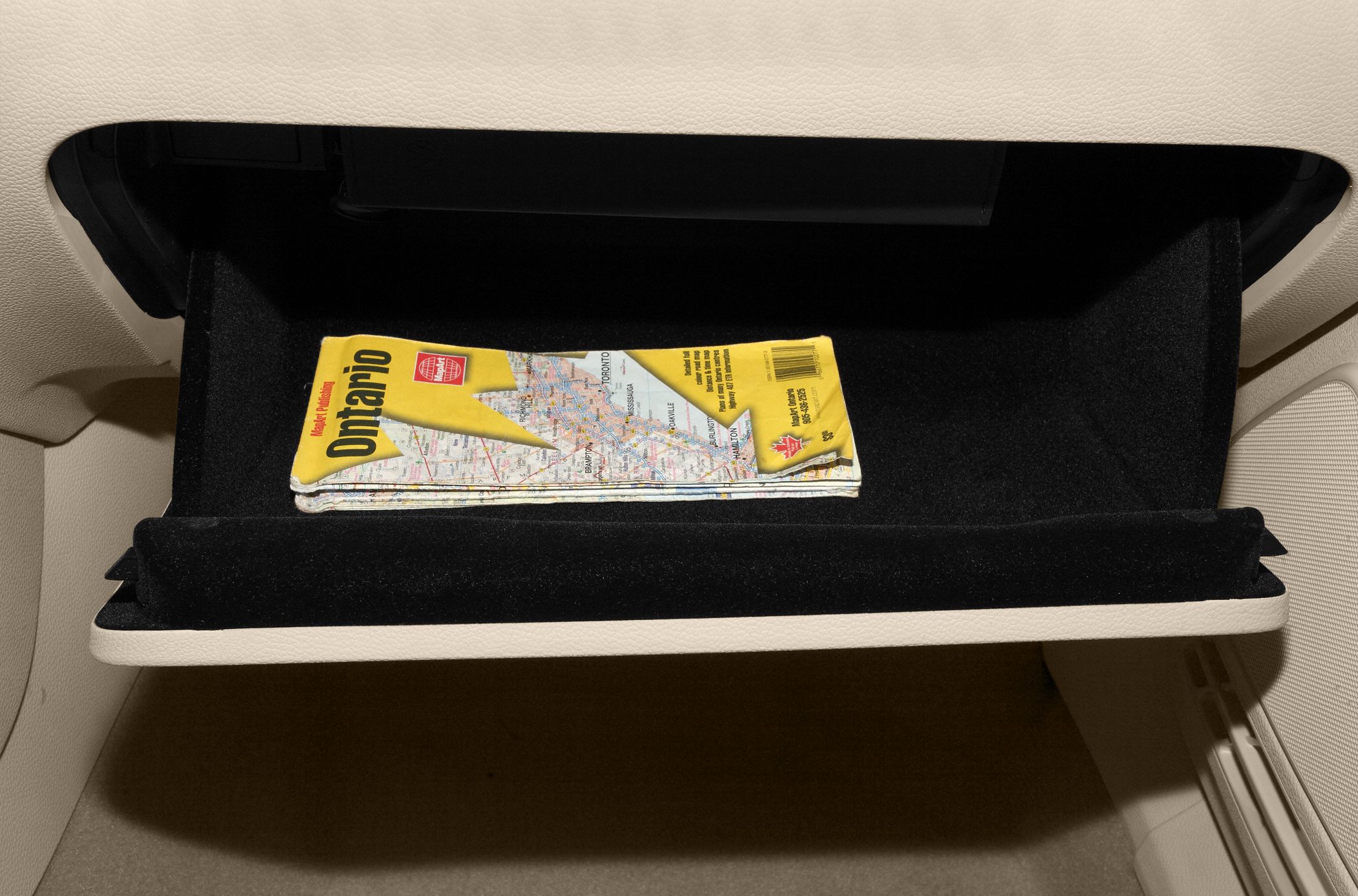 Glove compartment interior with folded map