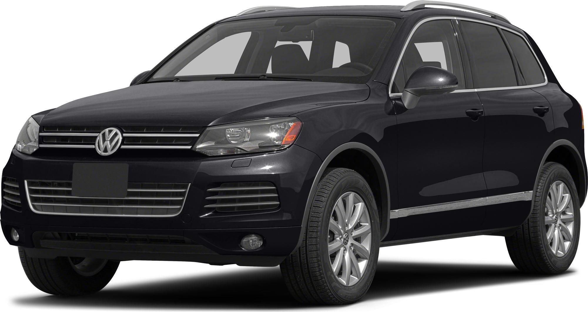 Front-side view highlighting headlights, grille, alloy wheels, and side mirror of a black SUV.