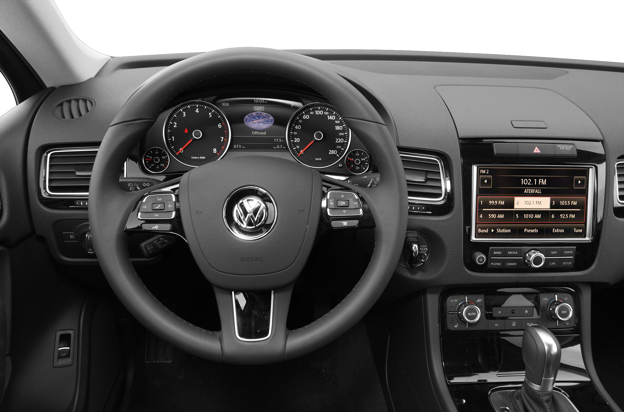 Steering wheel, dashboard gauges, infotainment display