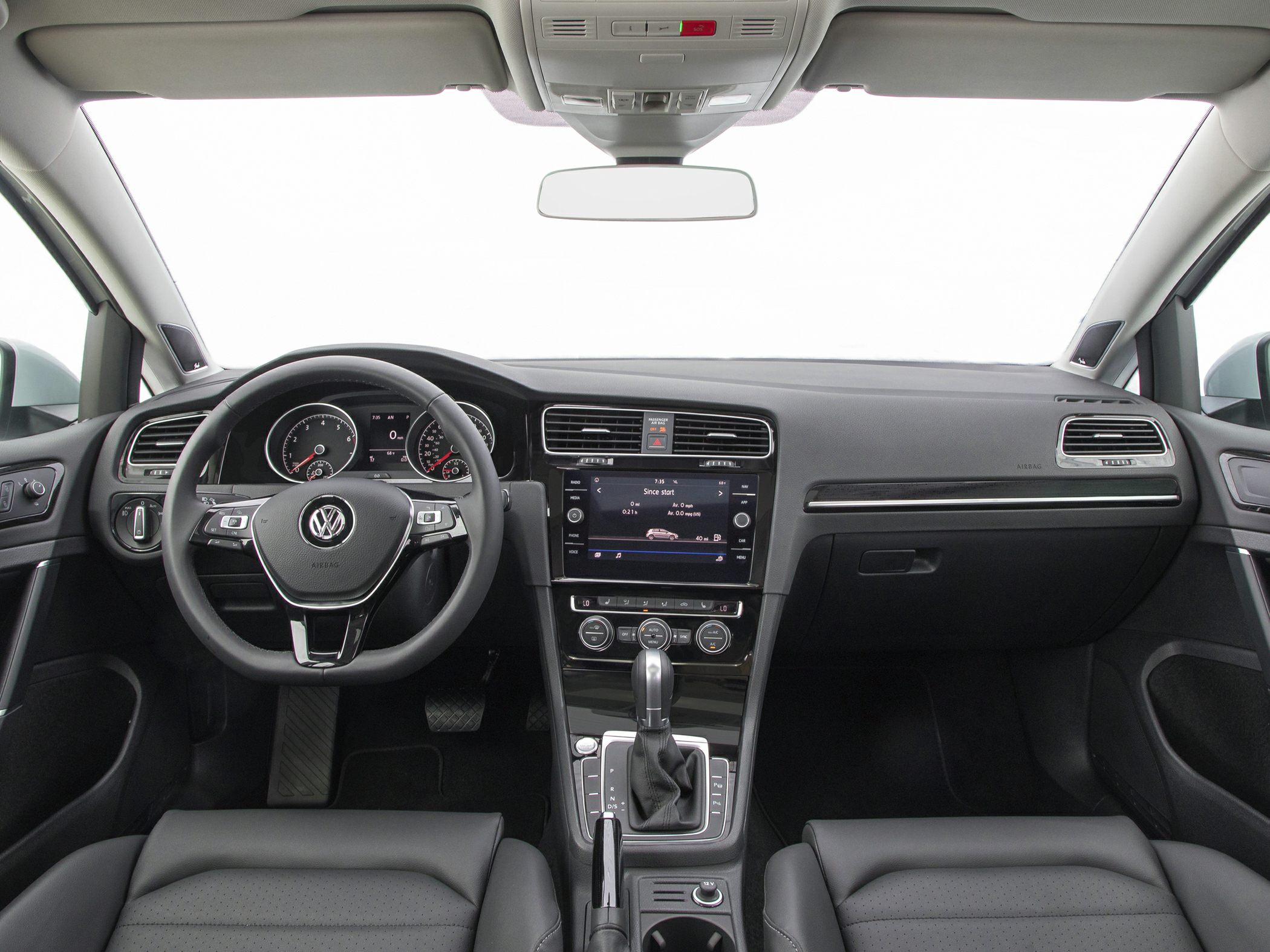 Steering wheel and central dashboard with infotainment system in car interior