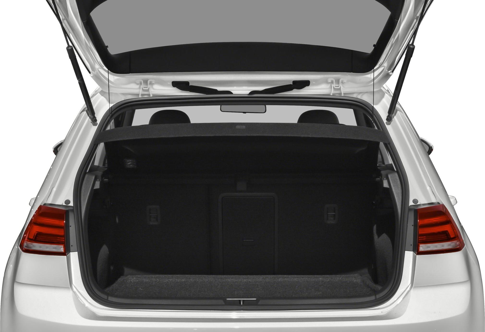 Open rear trunk cargo space in small hatchback with rear seats visible