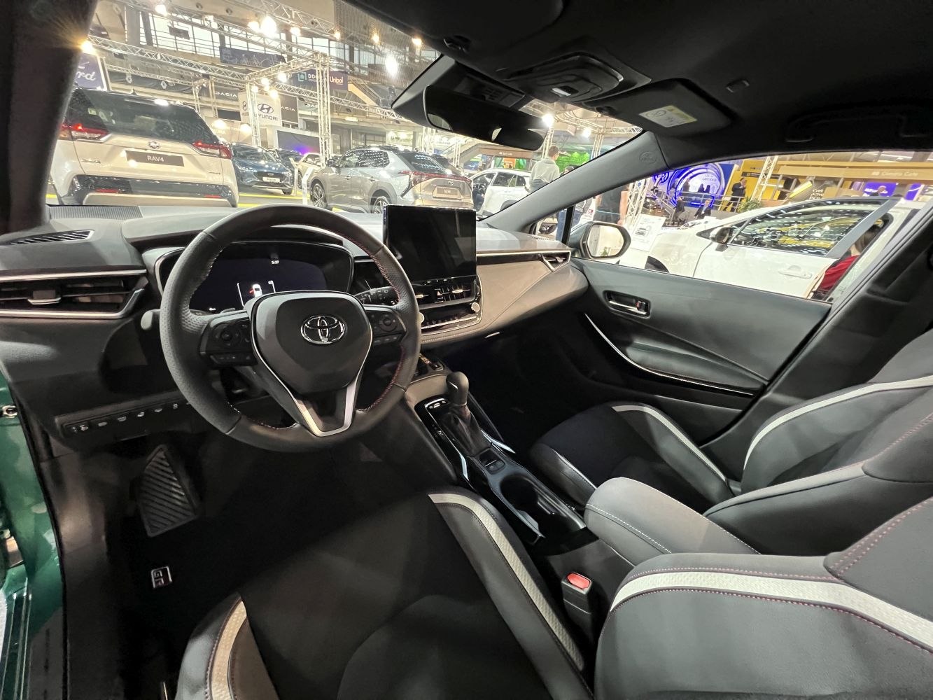 Modern car interior with digital dashboard and touchscreen center console