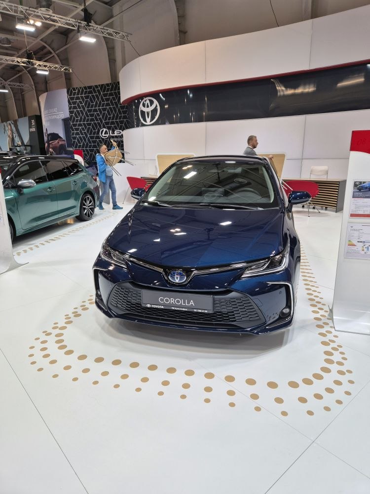 Front view of a modern hatchback with updated grille and headlights