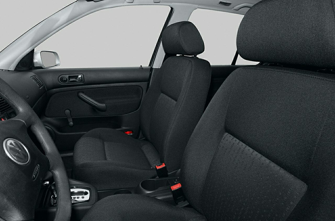 Front seats and steering wheel with manual window crank and automatic gear shift