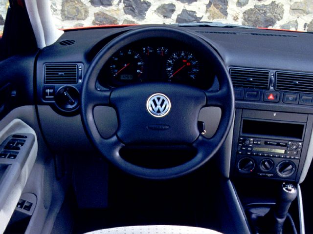 Dashboard and steering wheel with center console controls
