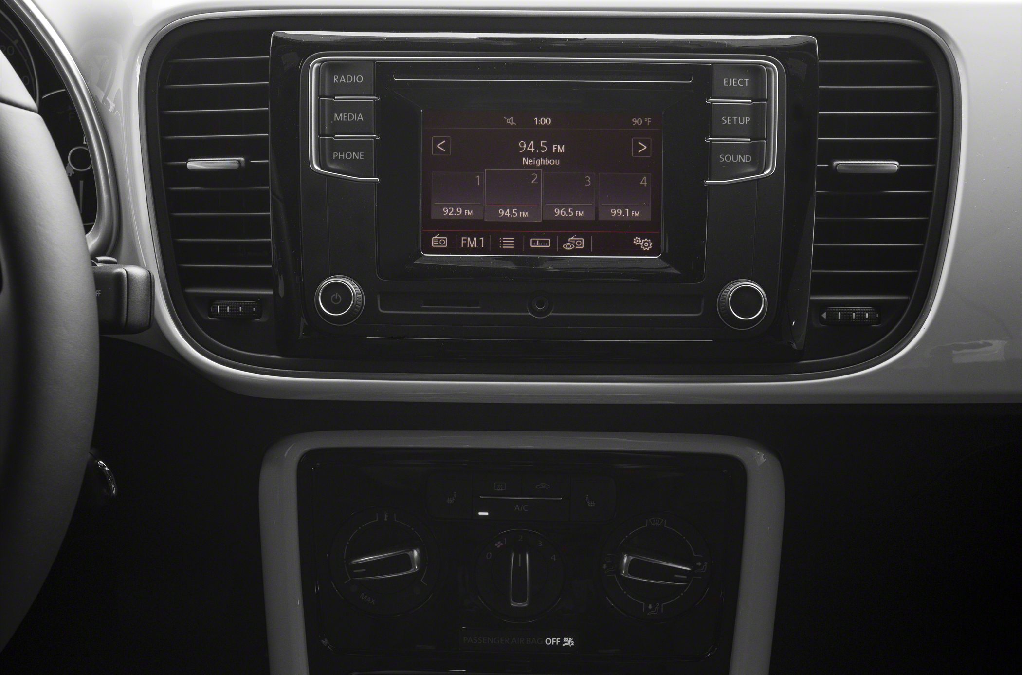 Infotainment system and climate control dials with dashboard air vents