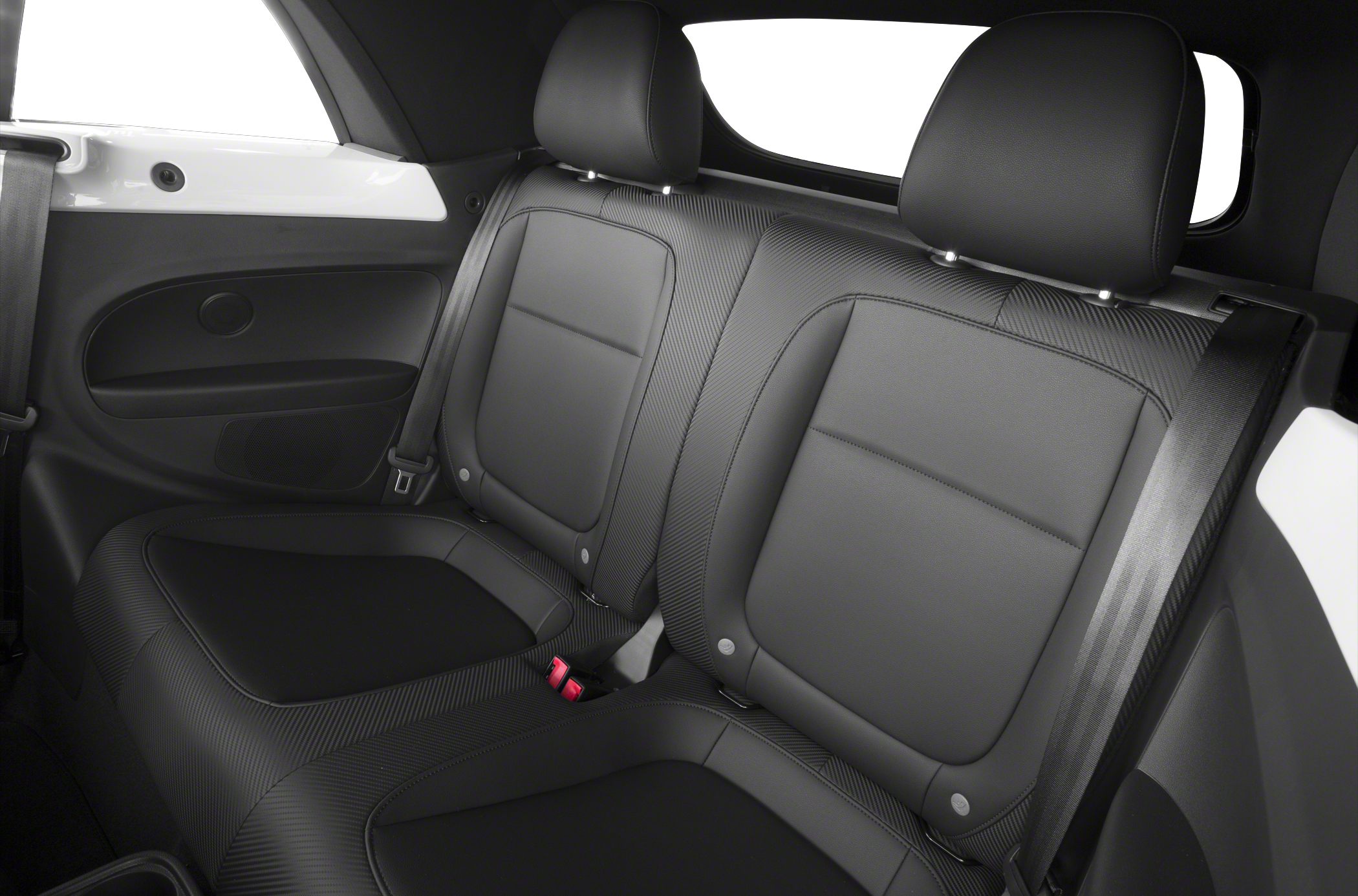 Black rear seats with leather upholstery, headrests, and seatbelts