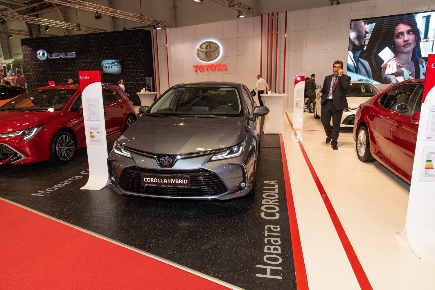 Front view of a Toyota Corolla Hybrid with sleek design and hybrid badge