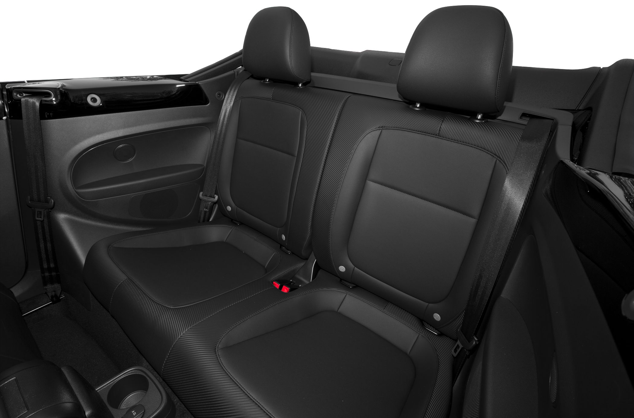 Black leather rear seats with headrests and seat belts in a convertible interior
