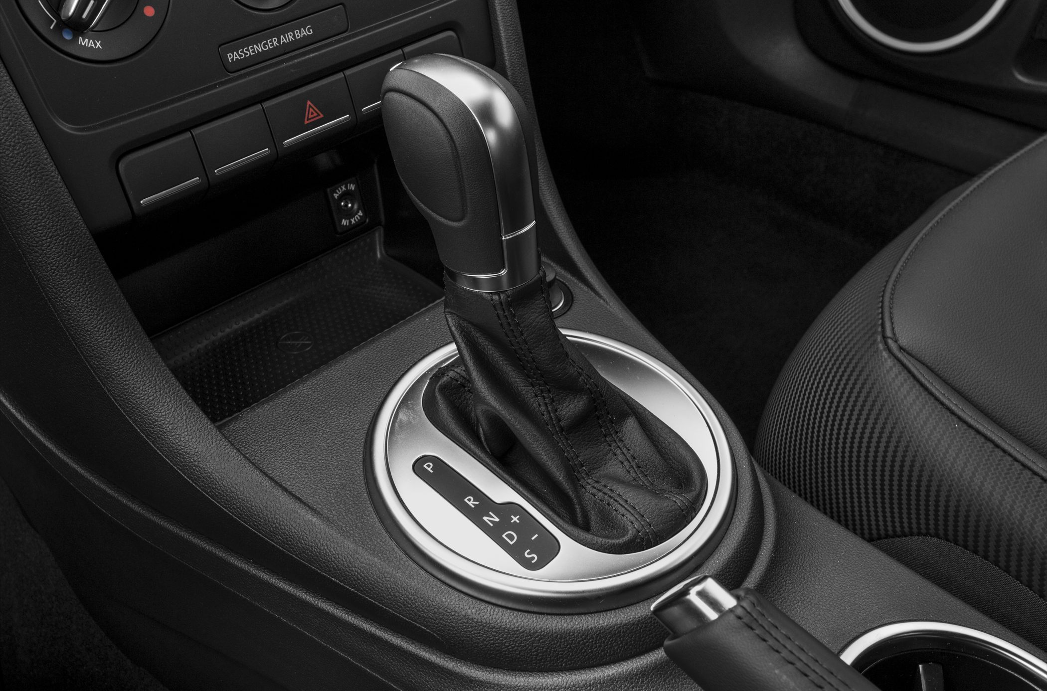 Automatic gear shift lever with leather and chrome accents