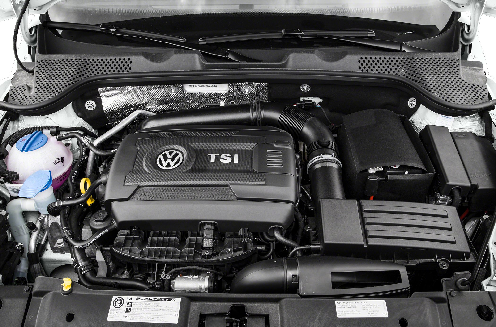 TSI turbocharged engine bay with branded cover and air intake components
