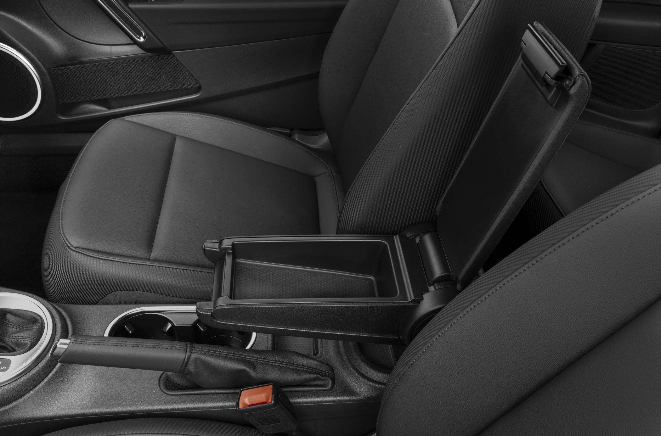 Center console armrest storage with cup holders and handbrake