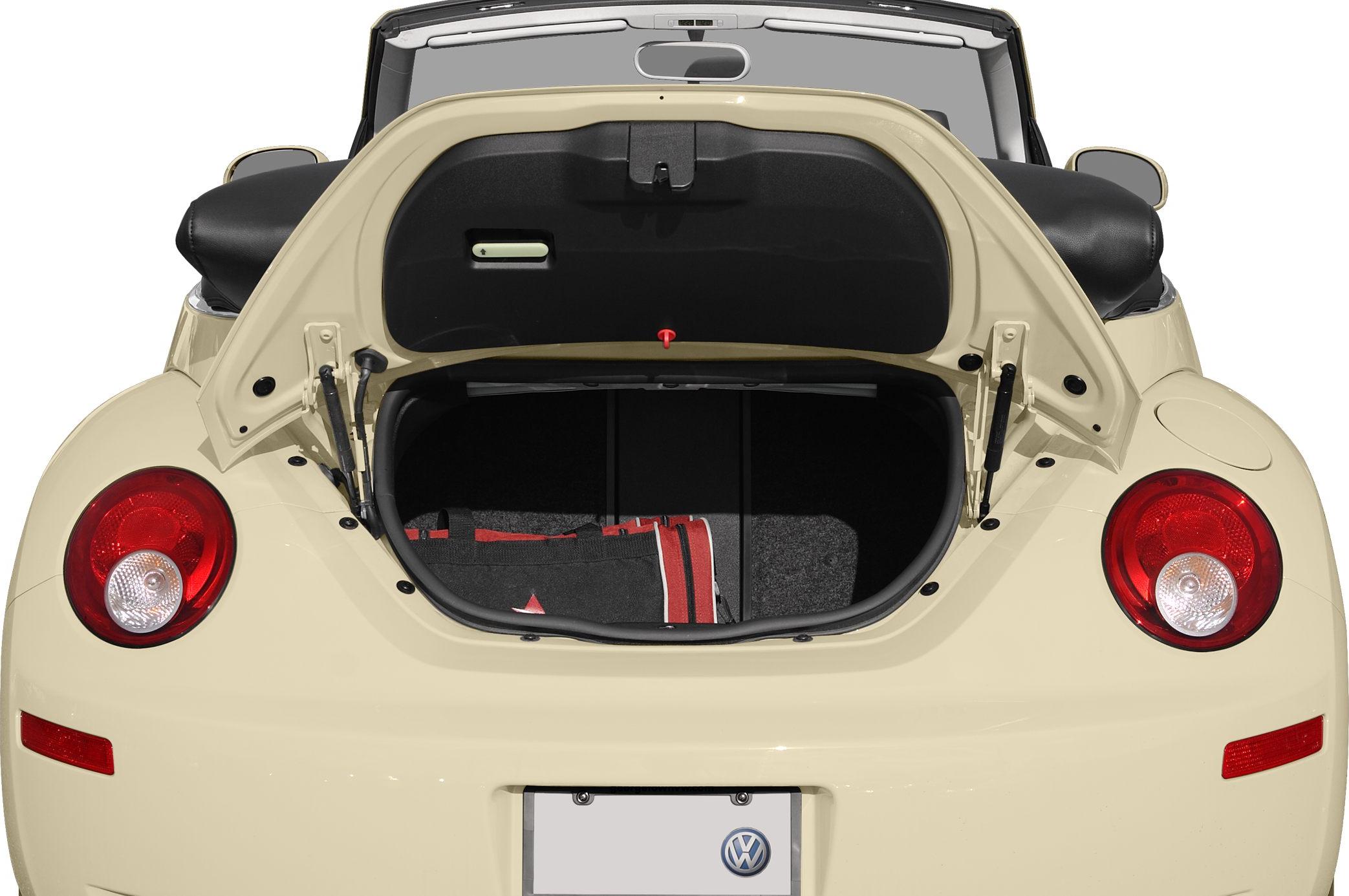 Open rear trunk with visible taillights and trunk hinges