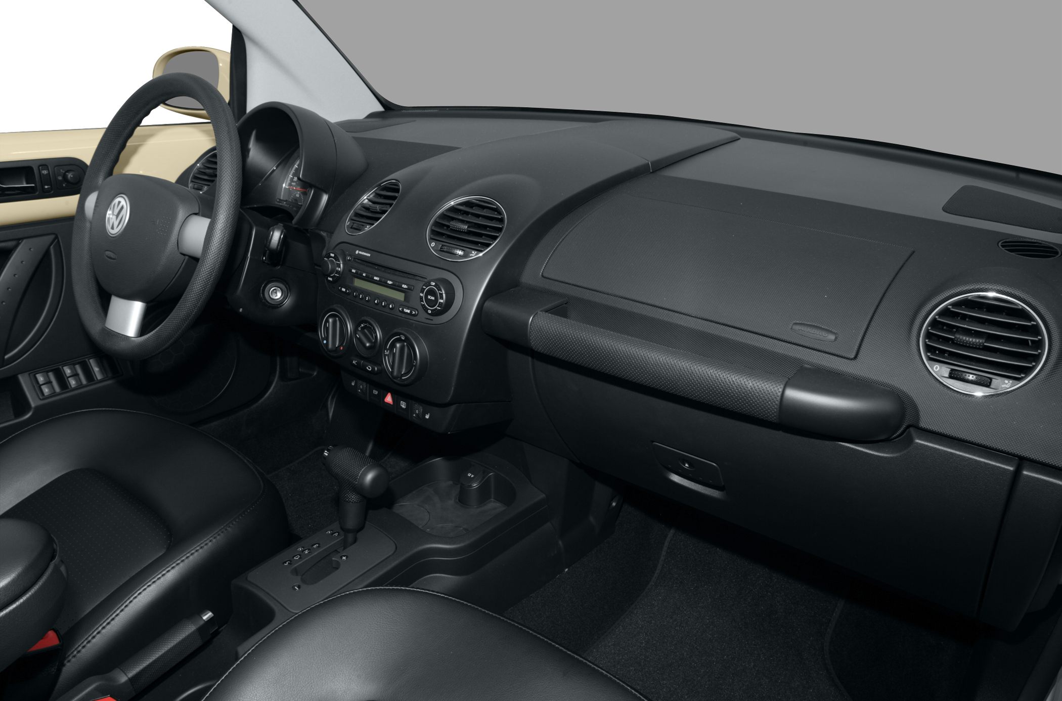 Dashboard and steering wheel with gear shift and air vents