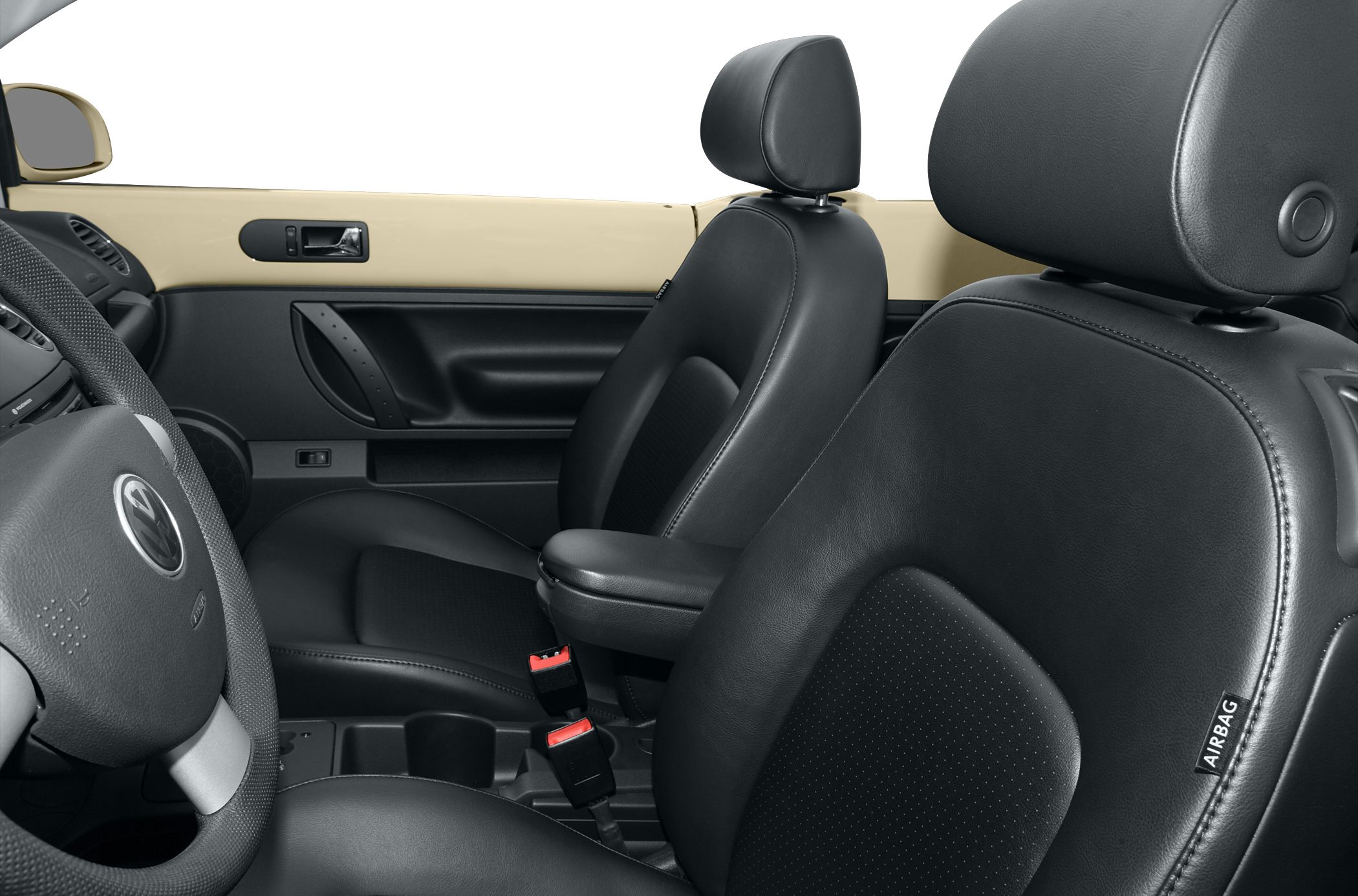 Black leather seats and beige door panel in convertible interior