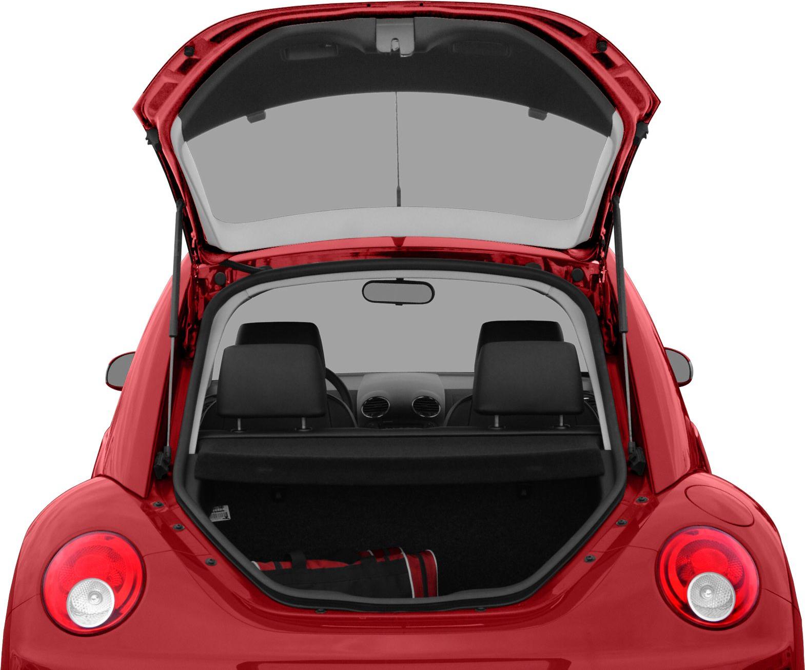 Open rear hatch showing trunk space and rear interior with two headrests