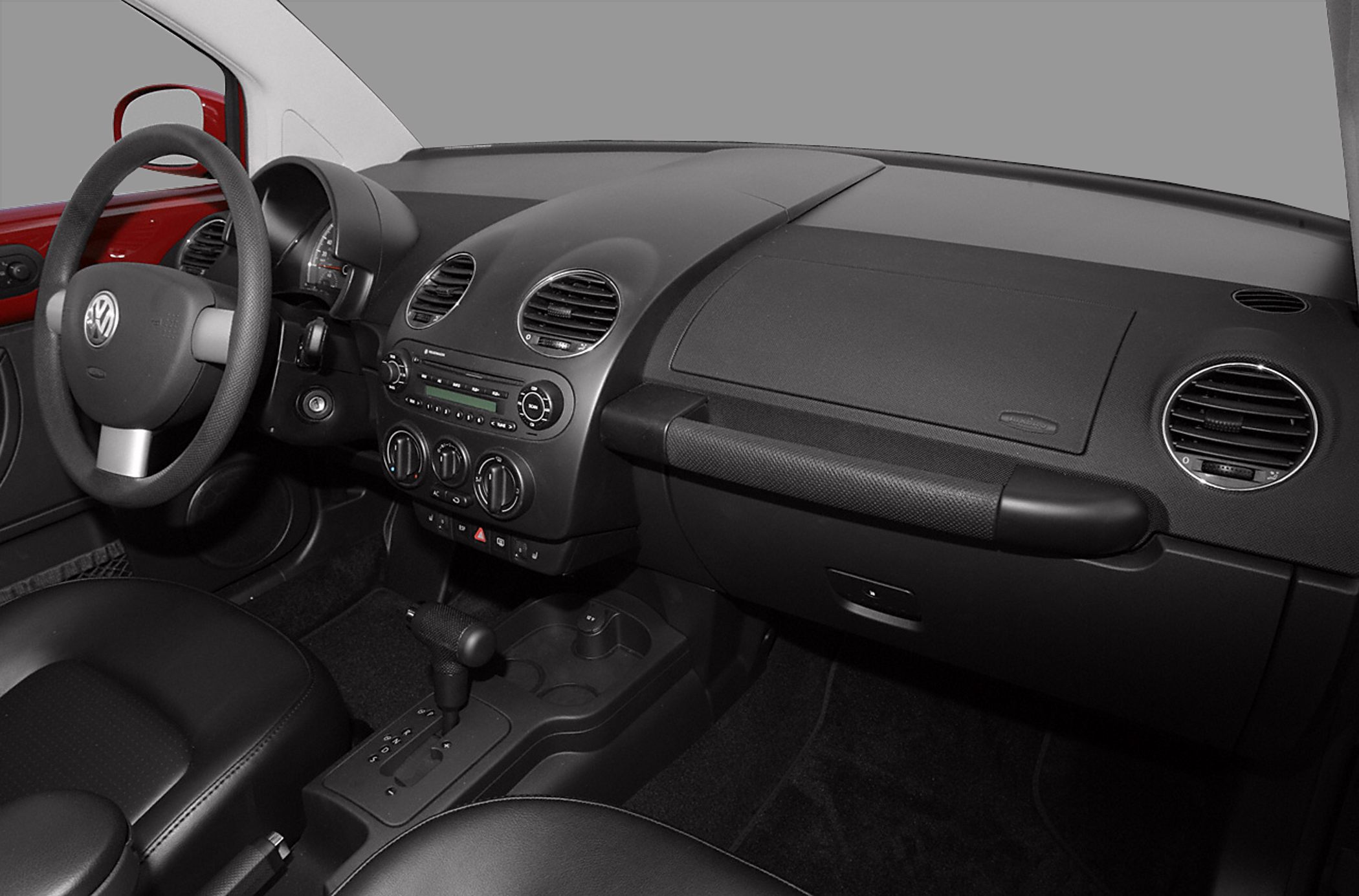 Interior dashboard and steering wheel with center console and controls