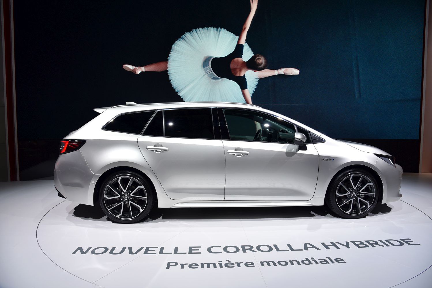 Sleek side profile of a hybrid wagon with alloy wheels