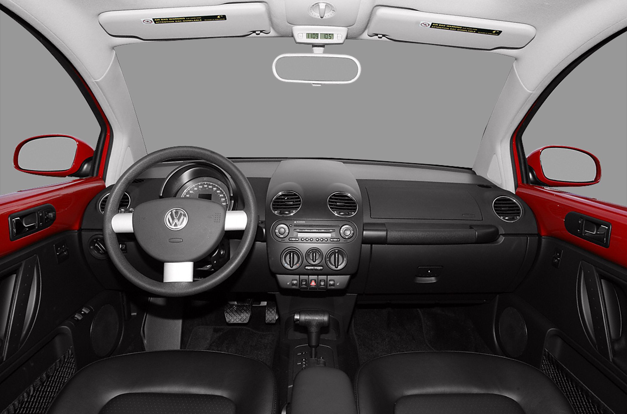 Rounded dashboard with steering wheel and center console