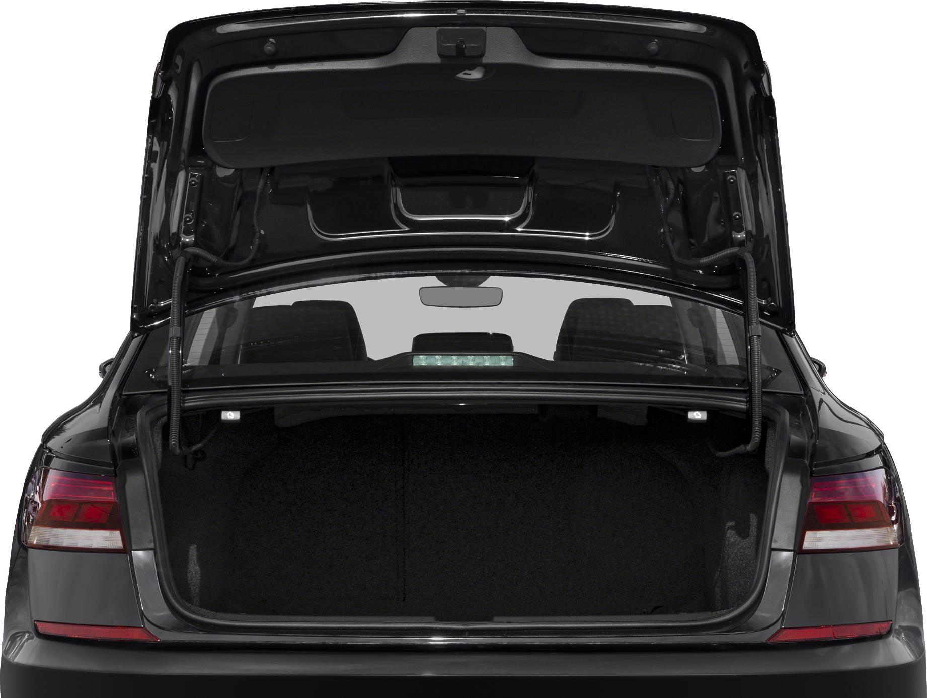 Open sedan trunk with visible interior and rear lights