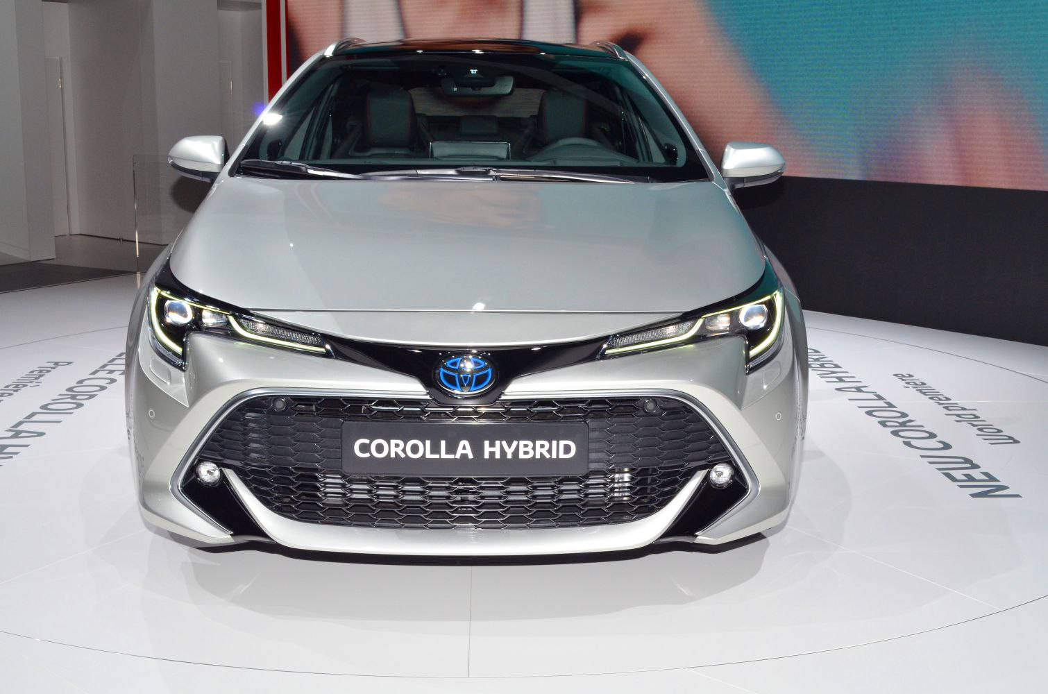 Front grille with LED headlights and hybrid badge