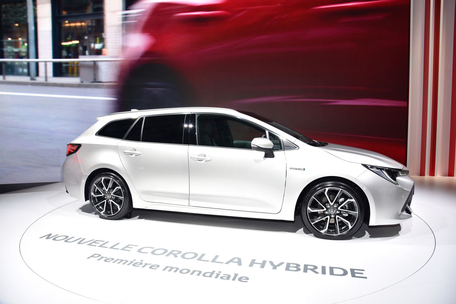 Side profile of hybrid station wagon with alloy wheels