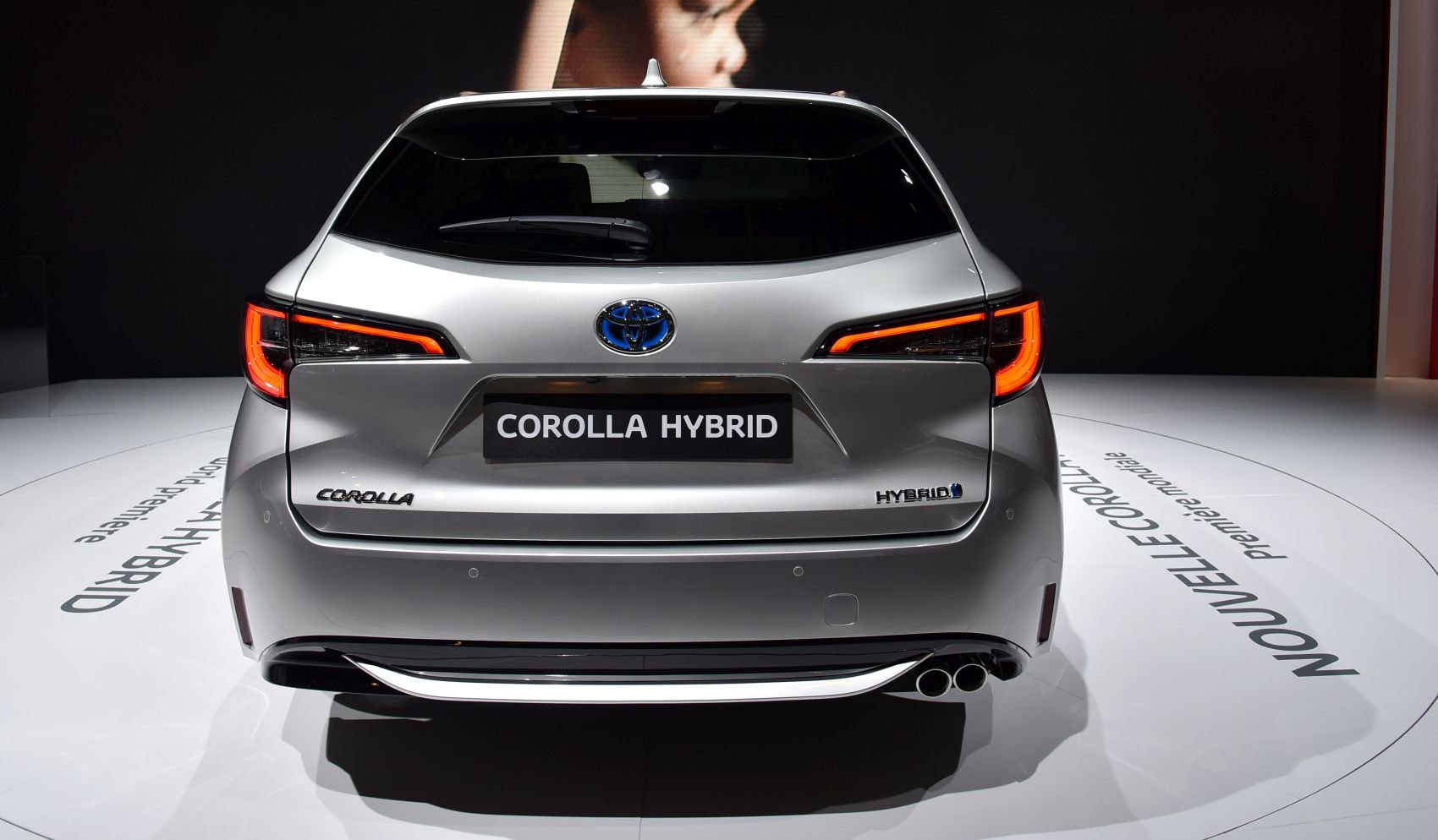 Rear view with distinctive LED taillights and dual exhaust pipes