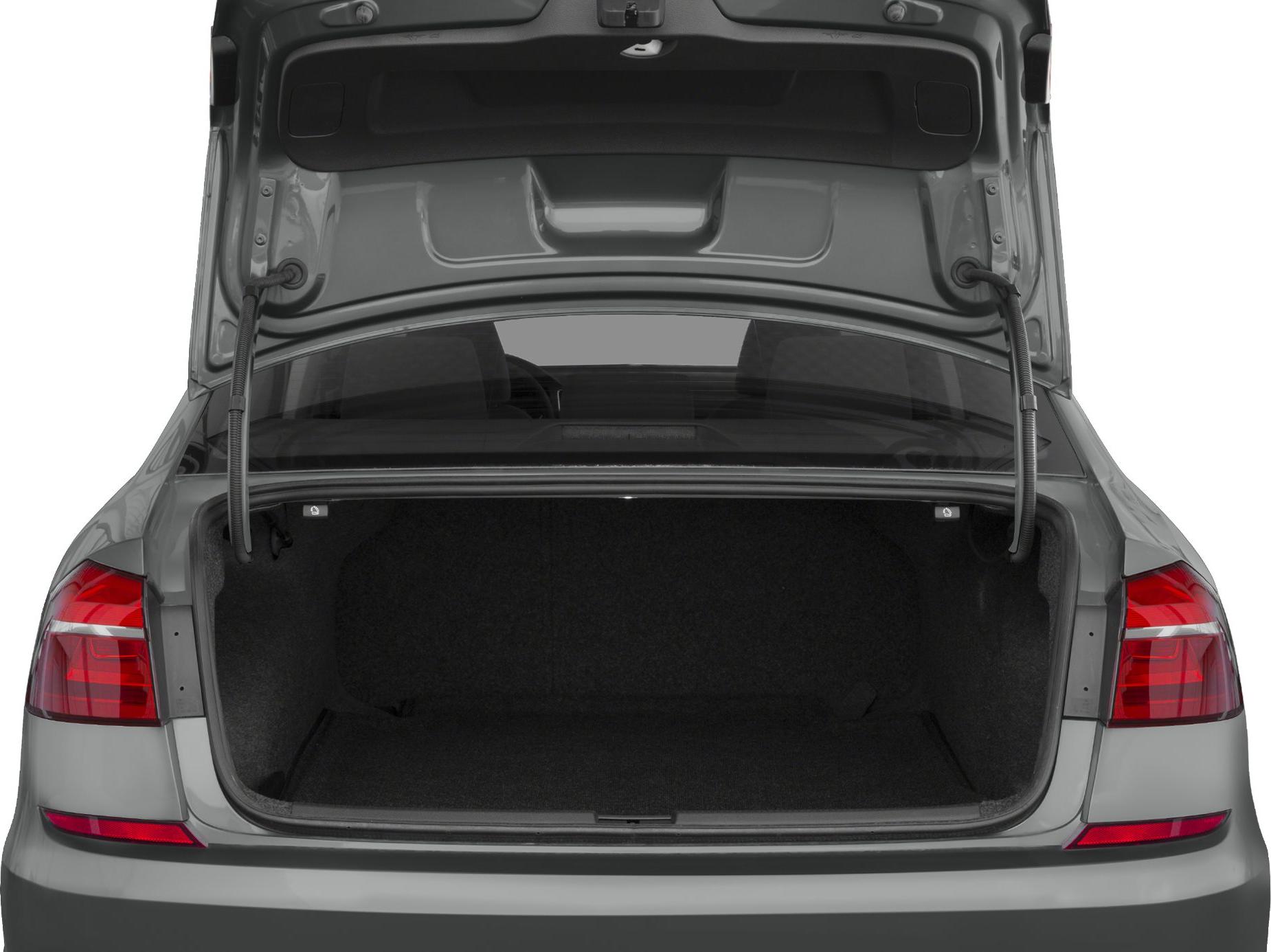 Open trunk and rear tail lights of a mid-size sedan