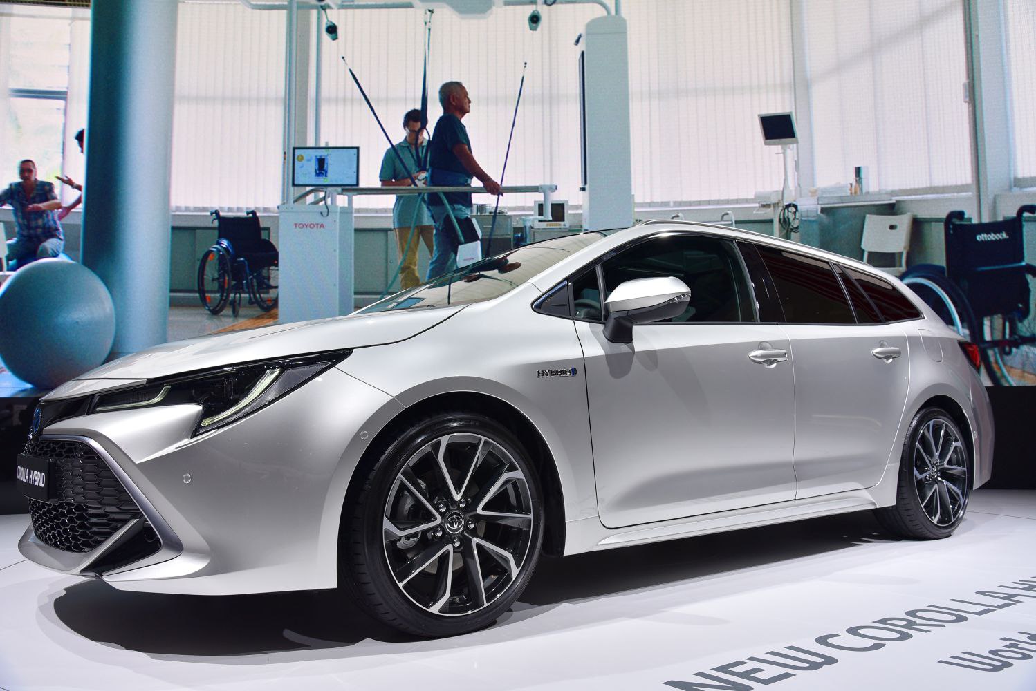 Silver hybrid hatchback with LED headlights and alloy wheels
