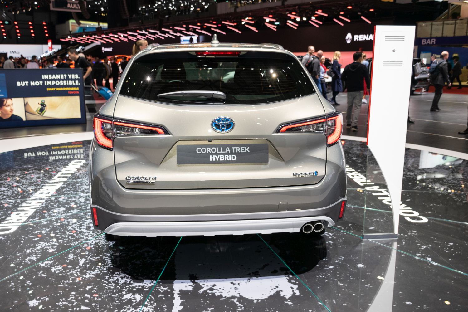 Rear view of hybrid station wagon with LED tail lights and dual exhaust