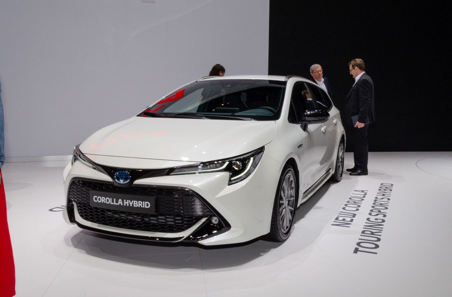 Sporty front grille with LED headlights on white hybrid wagon