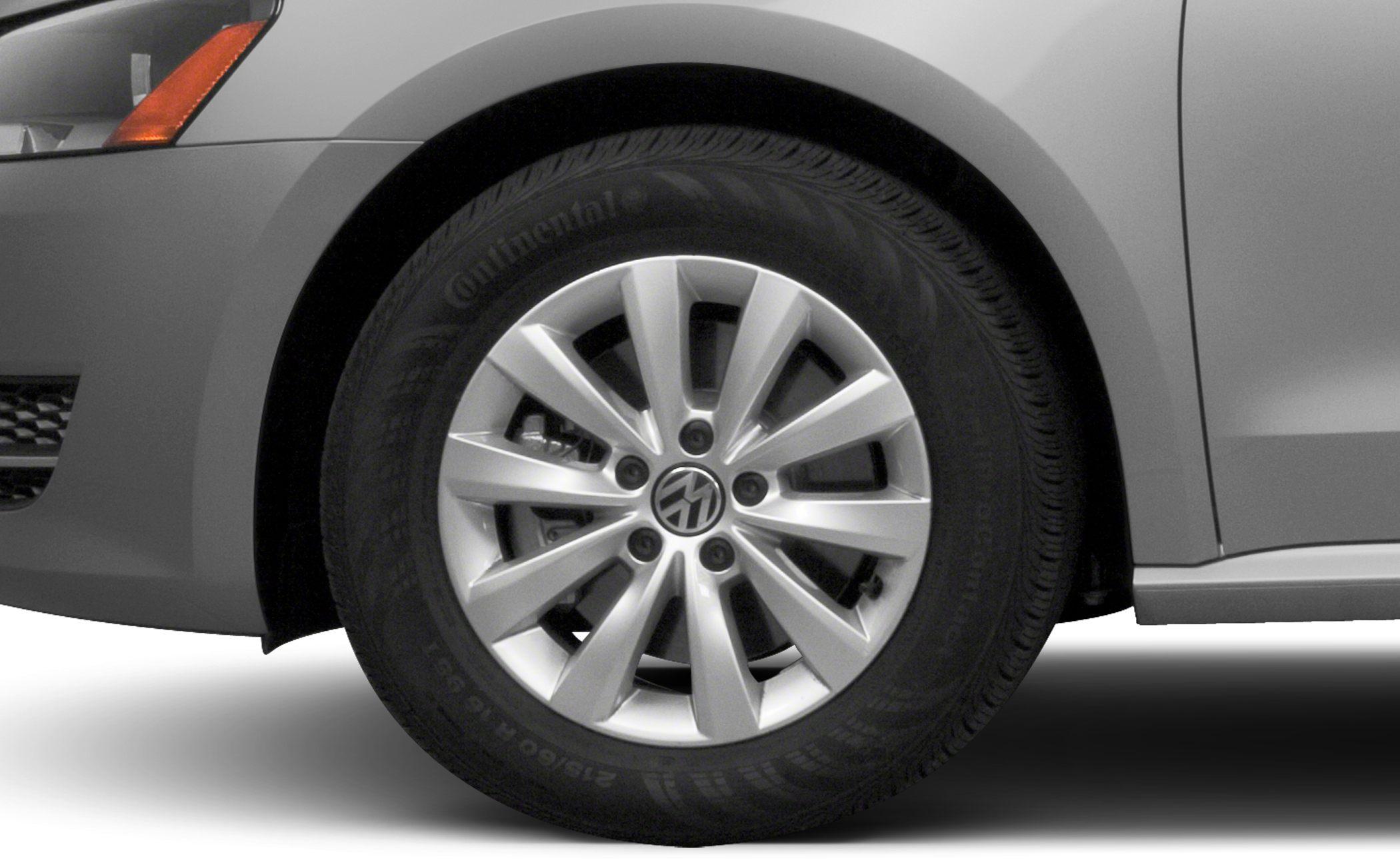 Close-up of alloy wheel and tire with Volkswagen emblem
