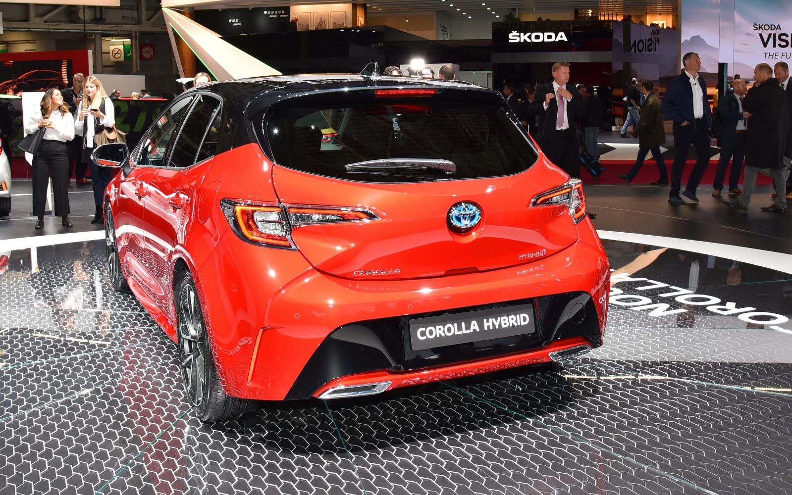 Hybrid hatchback rear view with LED taillights and two-tone paint
