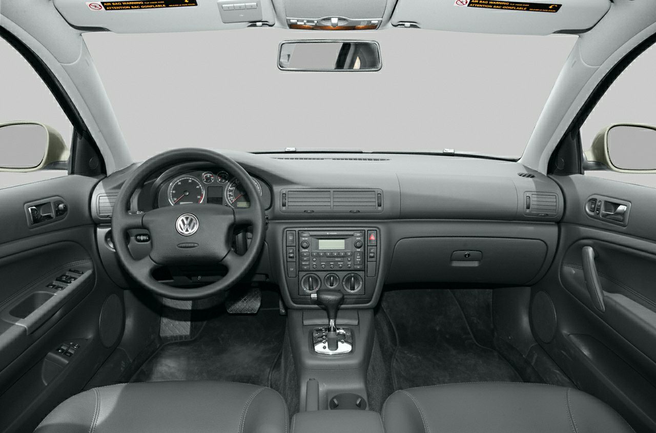 Dashboard, steering wheel, and center console of a car interior