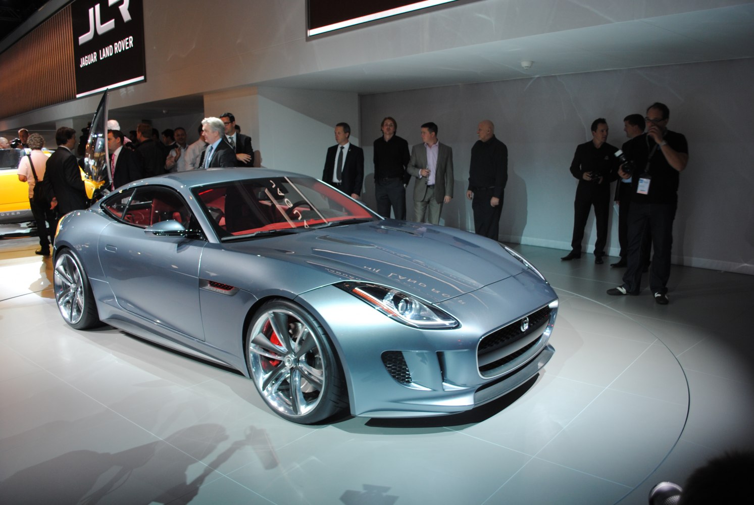 Metallic sports coupe with sleek body and large alloy wheels
