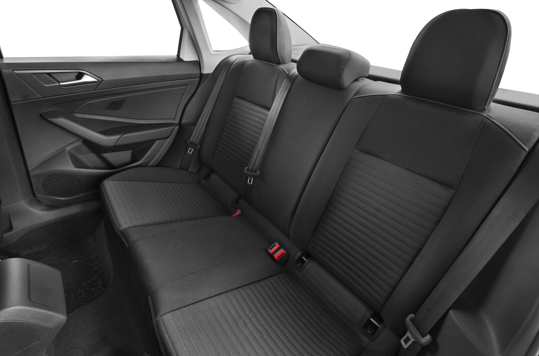 Rear seat interior with black upholstery and seat belts