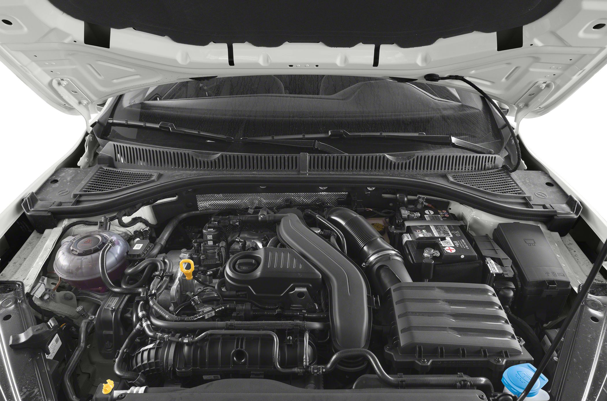 Modern Volkswagen Jetta VII engine bay with visible components and fluid reservoirs